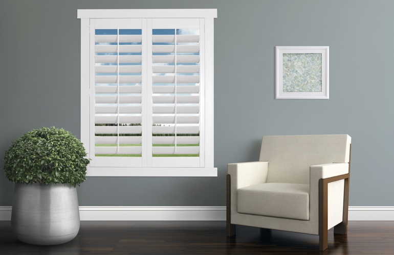 White plantation shutters in a contemporary room